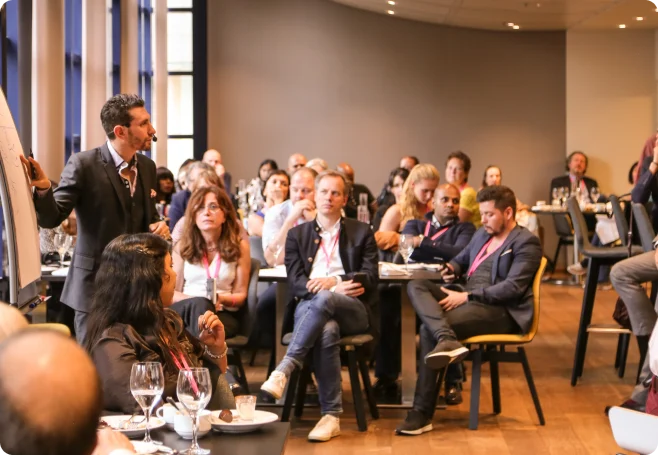 Kane teaching entrepreneurs in a live business workshop